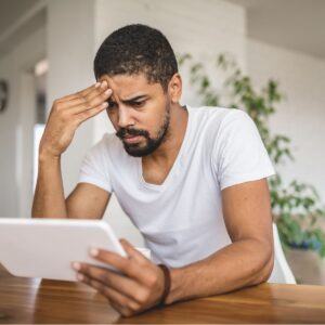 Business owner stressed about cash flow